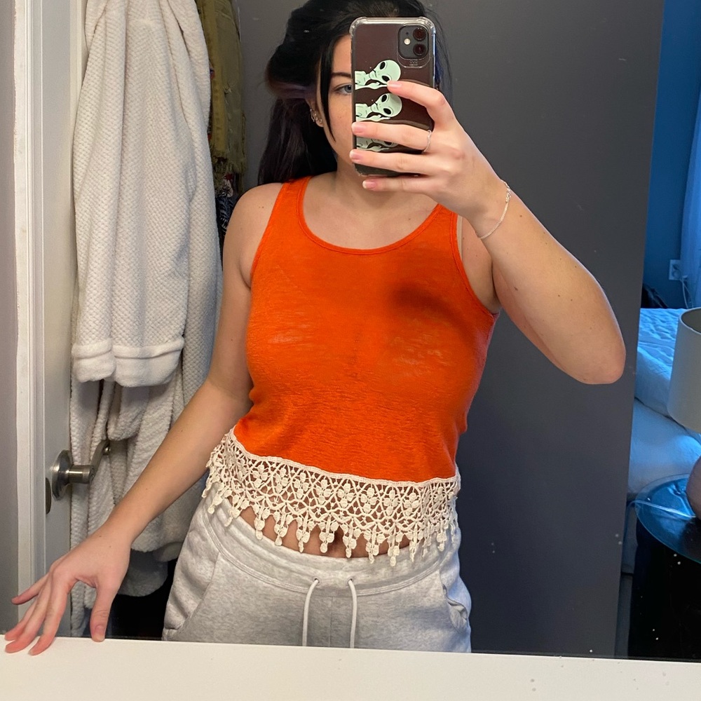 Orange tank top with crochet trim